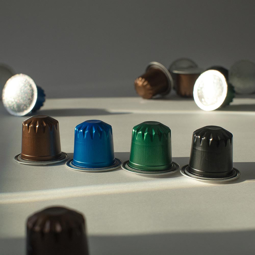 A hopper full of ready-to-fill espresso capsules.