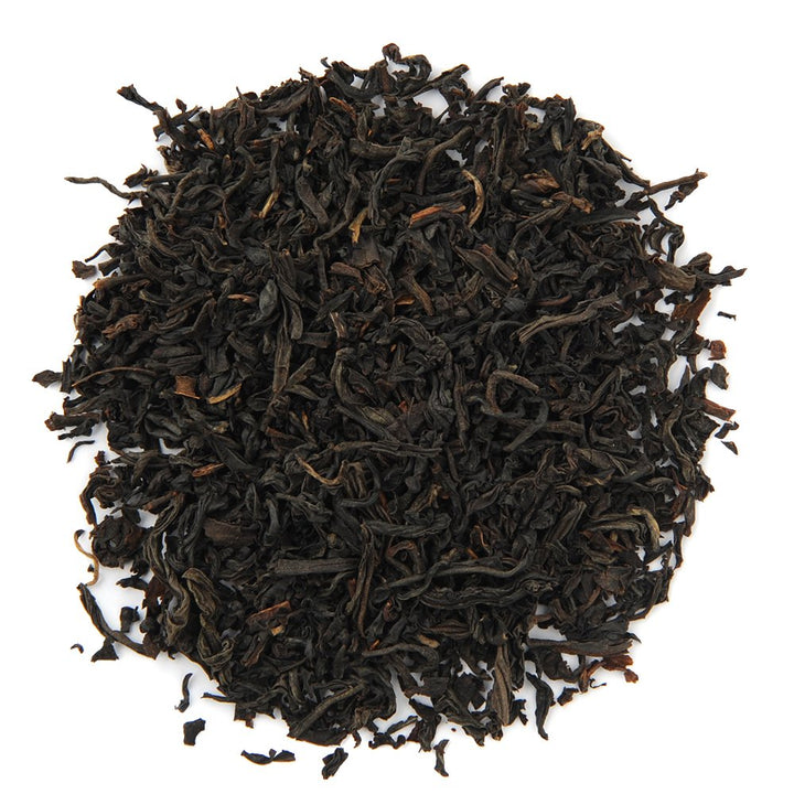 Organic English Breakfast loose leaf black tea, showcasing premium tea leaves with rich, bold flavor notes.