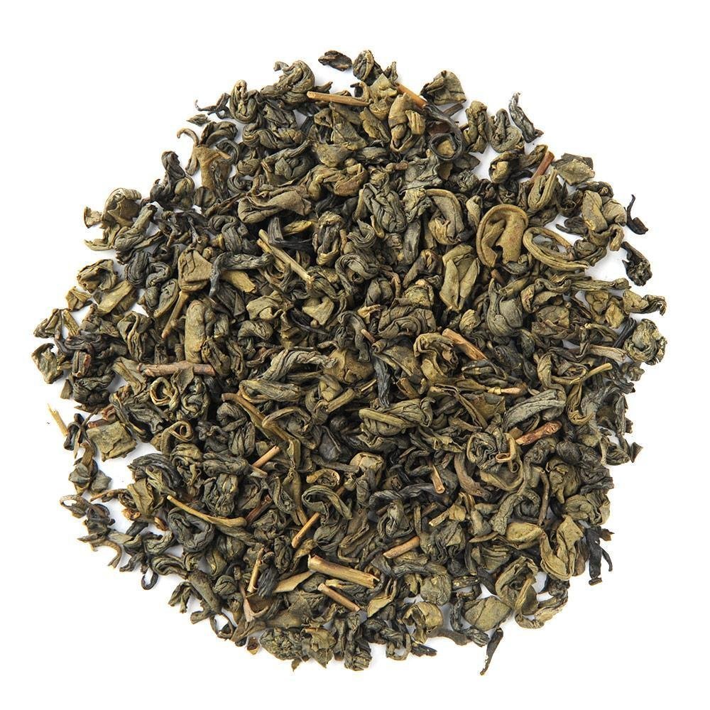 Organic Pinhead Gunpowder green tea leaves, tightly rolled pellets offering a bold and smoky flavor profile.