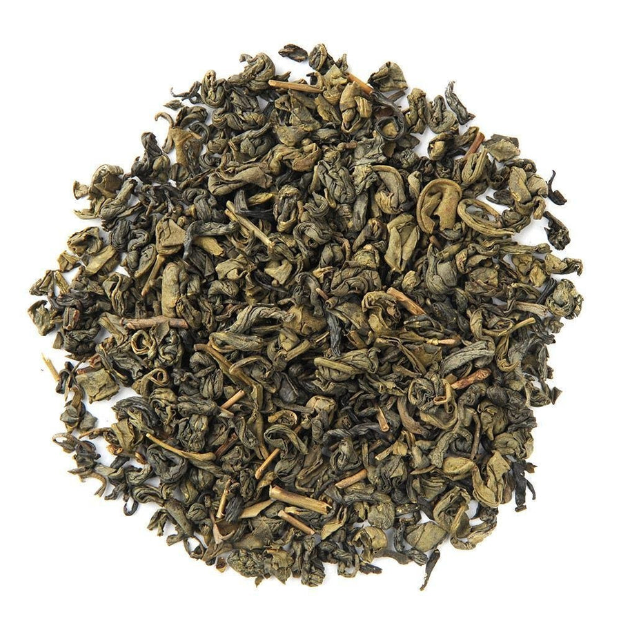 Organic Pinhead Gunpowder green tea leaves, tightly rolled pellets offering a bold and smoky flavor profile.