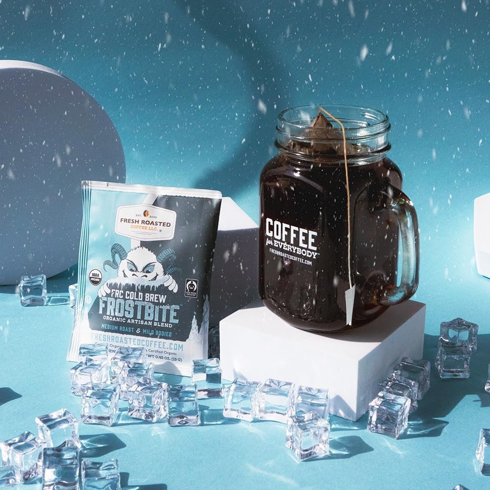 Fresh Roasted Coffee Frostbite Cold Brew sachet displayed with a glass of iced coffee, mild body with dark chocolate notes.