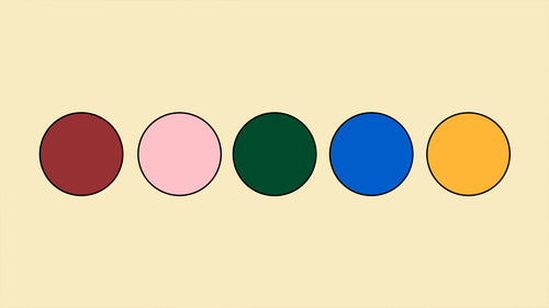 Five colored dots on a cream background.
