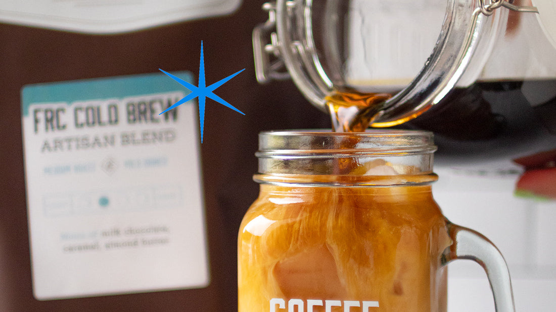 Cold brew coffee being poured out of a large container.