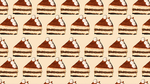 Many slices of tiramisu on a cream background.