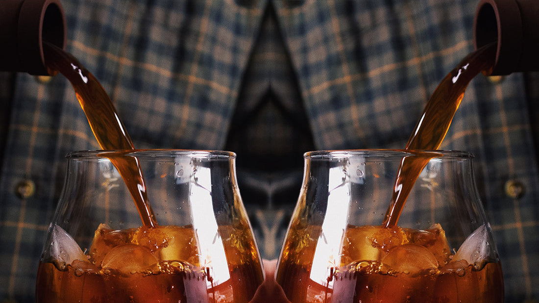 A mirrored image of cold brew being poured into an iced glass.