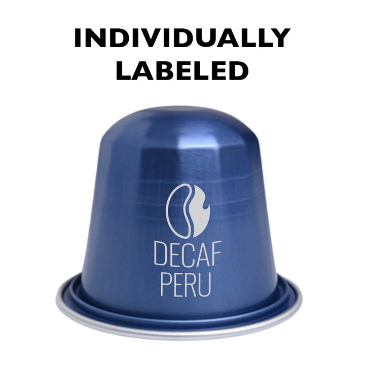Fresh Roasted Coffee Peru Organic Water-Processed Decaf Espresso Capsule, individually labeled, featuring a medium roast with almond and chocolate notes.