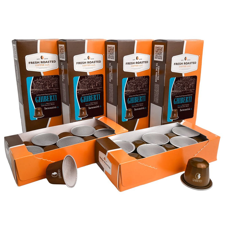 Fresh Roasted Coffee Ghiberti espresso capsules, bulk multi-pack display of 60 pods, offering bold Italian dark roast flavor with notes of black currant, dark chocolate, and merlot.