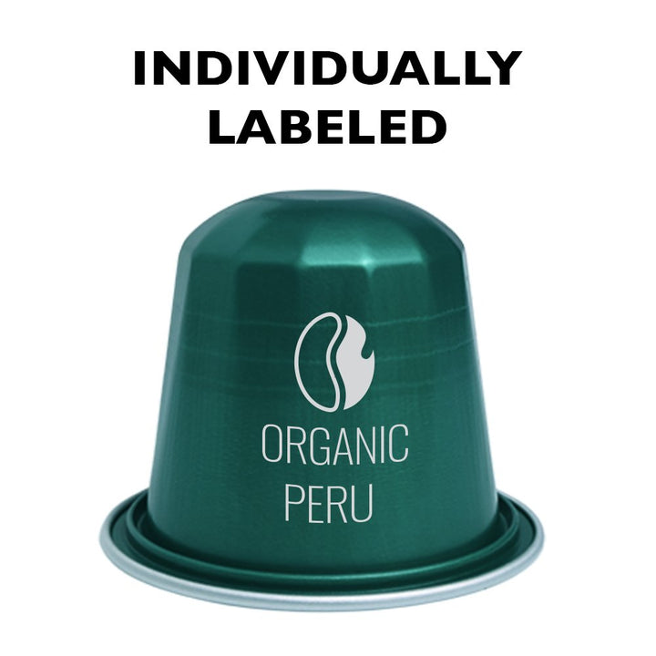 Fresh Roasted Coffee Peru Organic Espresso Capsule, individually labeled, medium roast with notes of cinnamon and caramel.